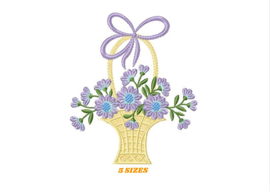 Embroidered design of a yellow basket filled with purple flowers, green leaves, and a decorative lavender bow on the handle.