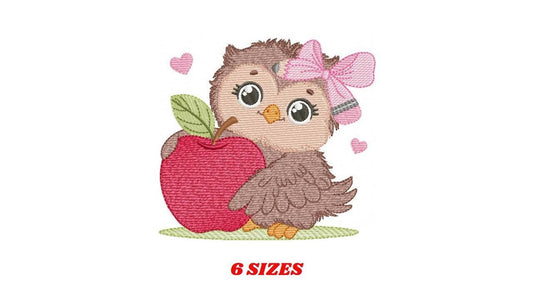 May include: Embroidered design of a brown owl with pink bow holding a red apple. The owl has large eyes and a cute expression. The design is perfect for embroidery projects.
