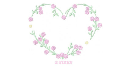 May include: A heart-shaped wreath made of green vines with pink roses. The wreath is on a white background. The text "2 SIZES" is below the wreath.