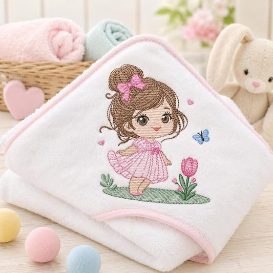 White hooded baby towel embroidered with princess girl embroidery design, pink tulip and blue butterfly accents