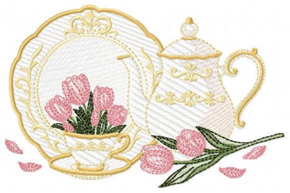 Close angled view of teapot and teacup embroidery design, gold outlines, rippled fill texture, pink rose accents