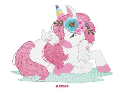 Unicorn baby embroidery design, side-lying white unicorn with long pink rippled mane, pastel horn and blue-pink floral crown