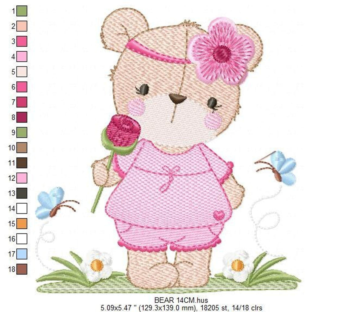 Large view teddy bear embroidery design, textured fill stitch detail, girl bear holding flower, grassy base