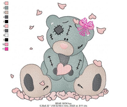Full-size vintage-style teddy with visible seams and beige paw pads, surrounded by petals, valentine teddy bear embroidery