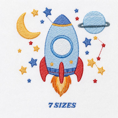 Close-up rippled filled rocket ship embroidery design on white, 7 sizes text visible